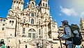 Young woman pilgrim in Santiago de Compostela, La Coruna, Galicia, Spain.