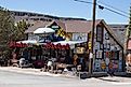 A quirky house in Goldfield, Nevada, covered in an eclectic assortment of road signs. Editorial credit: Megan Frost Photography / Shutterstock.com