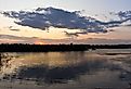 Sunset reflecting at Havel, Germany. Image credit Randy Pr via Shutterstock.