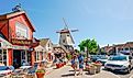 Main street, street view, and tourists in Solvang, beautiful small town in California, town has known for its traditional Danish style architecture. Editorial credit: HannaTor / Shutterstock.com
