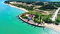 Pointe Betsie Lighthouse on Lake Michigan at Frankfort, Michigan. Image credit: Dennis MacDonald / Shutterstock.com