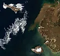 Sea ice fragments drift near Alaska’s Saint Lawrence and Nunivak islands and colorful water surrounds the Yukon Delta in natural-color (left) and false-color (right) images acquired with the MODIS (Moderate Resolution Imaging Spectroradiometer) on NASA's 