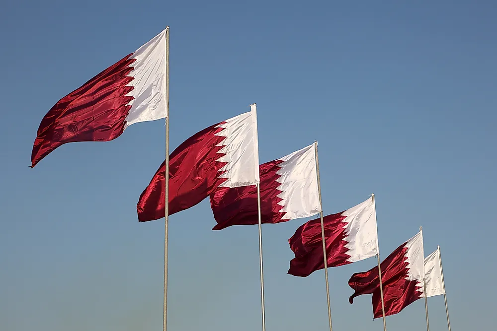 What Do The Colors And Symbols Of The Flag Of Qatar Mean?