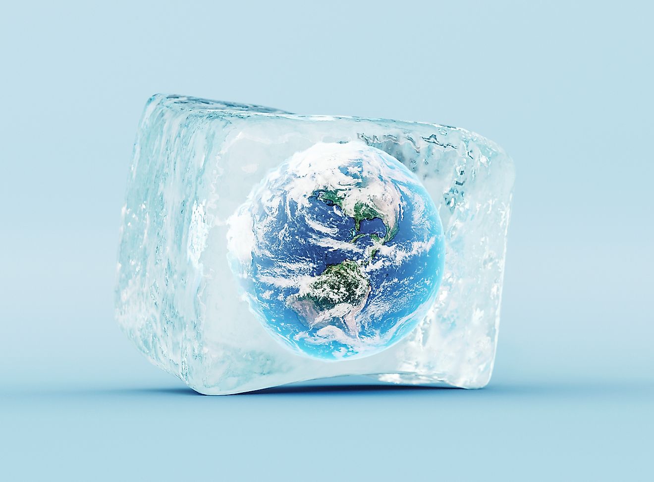 Ice stories. Глобус в замороженном виде. Заморозка Глобус. Серебрянный куб в воде.