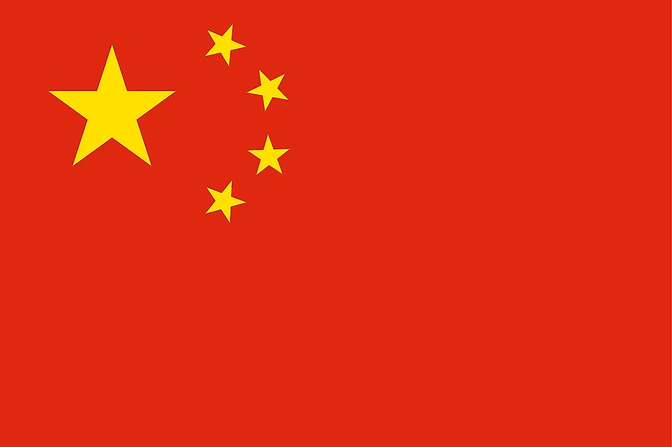 The National Flag of the People’s Republic of China (“Five-star Red Flag”) features a red background with a large yellow star and four smaller stars in the upper hoist-side corner