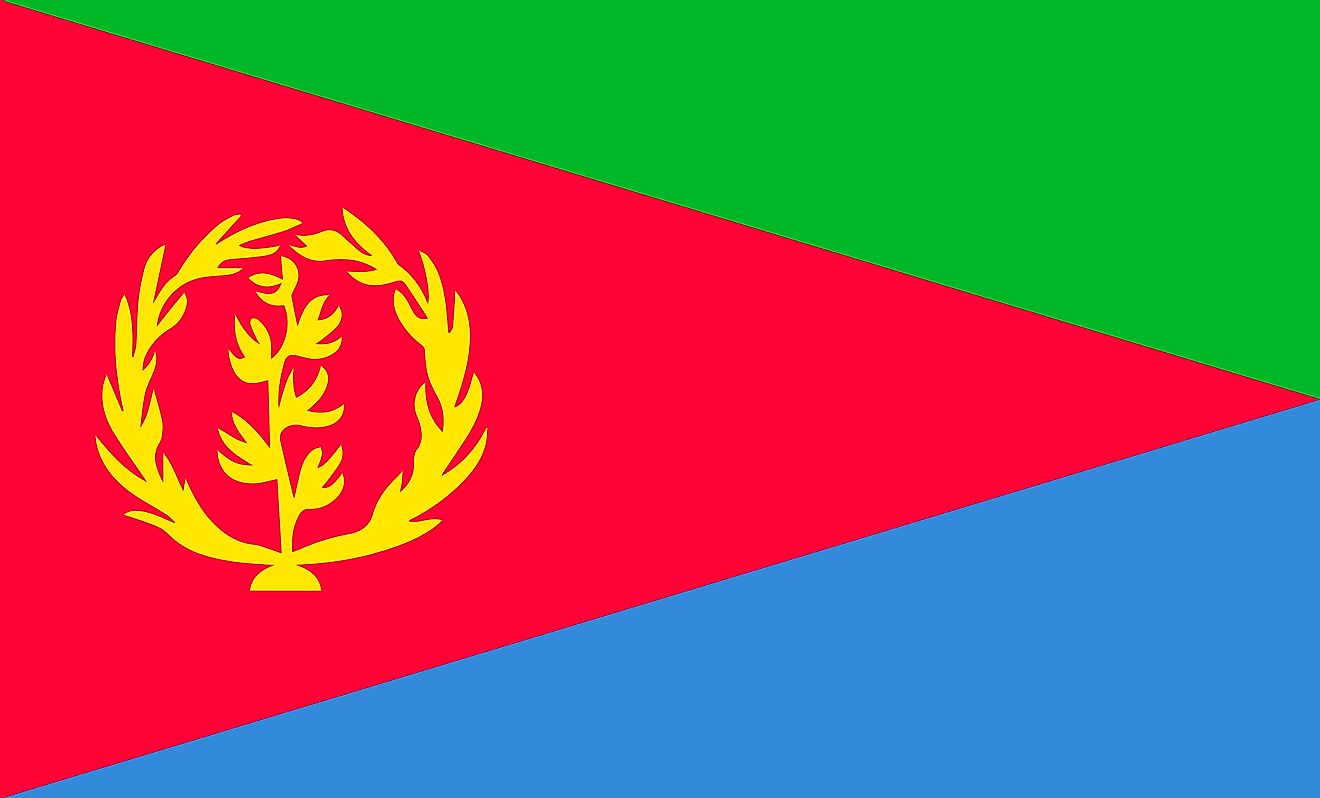 The National Flag of Eritrea features three triangles of the colors red, green, and blue and a yellow colored emblem on the red triangle placed towards the hoist. 