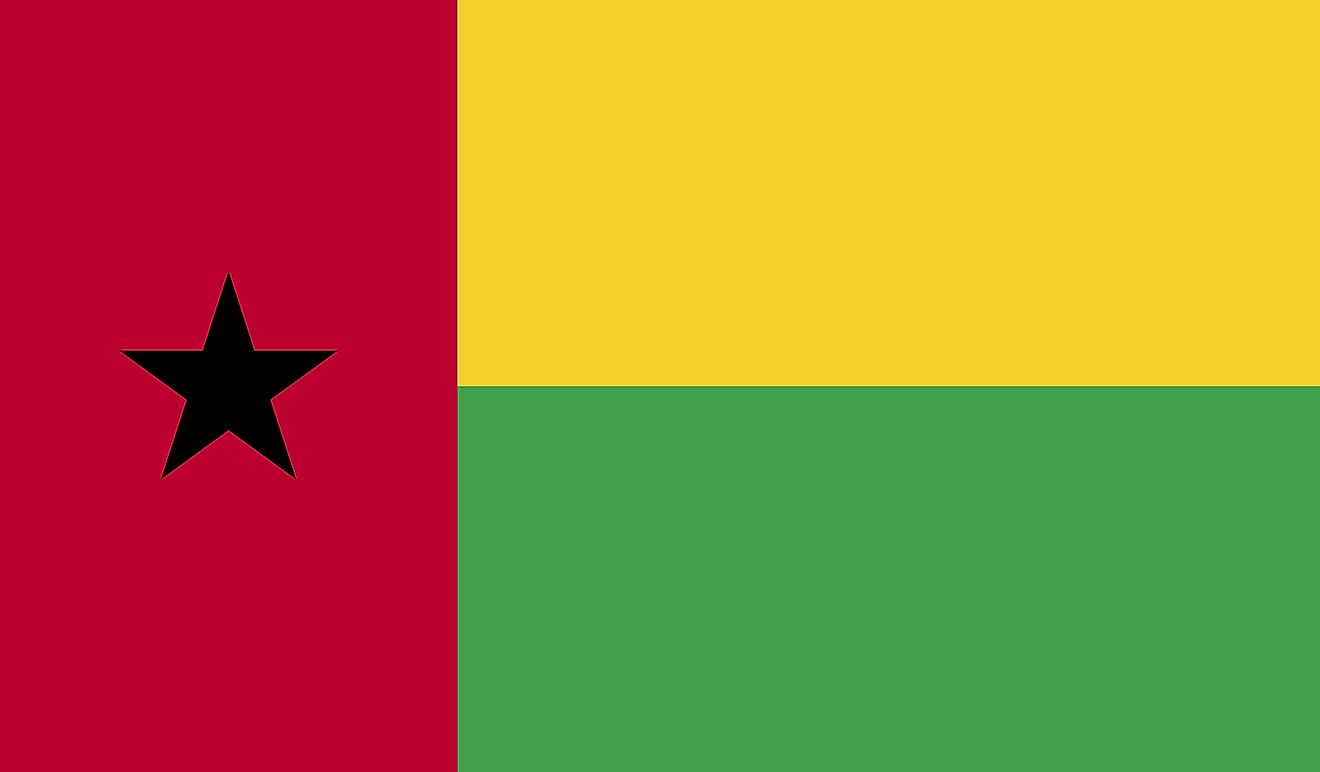 The national flag of Guinea-Bissau is a tricolor flag of red vertical band, with 5-pointed star in the middle, on the hoist side and two equal horizontal bands of yellow (top) and green.