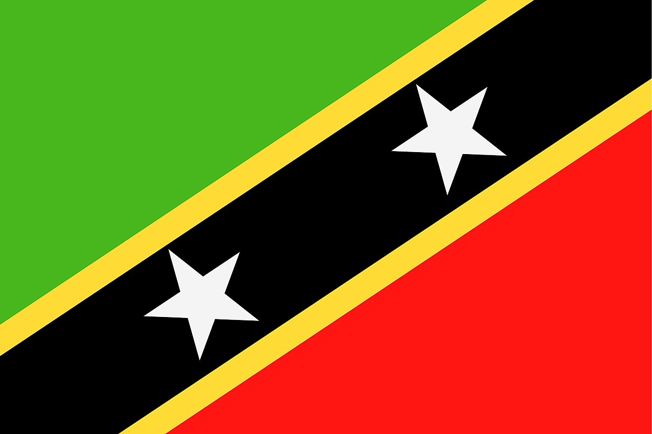 The flag features a black band with yellow edges running diagonally from the lower corner of the flag's hoist-side to the upper fly-side corner, resulting in green (upper hoist) and red (lower fly) triangles. The diagonal band has two white five-pointed s