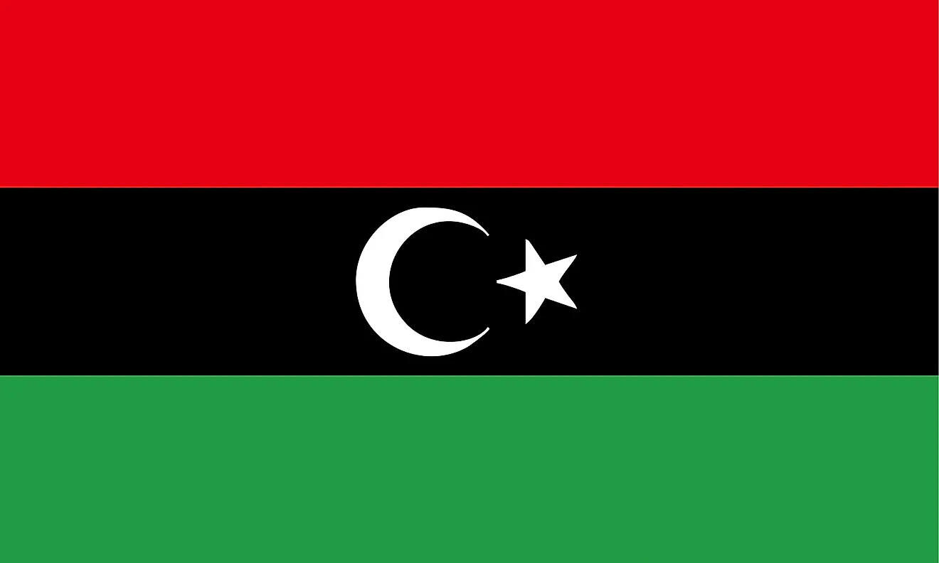 The flag of Libya is a tricolor flag of red, black, and green horizontal bands with white crescent and 5-pointed star centered on black