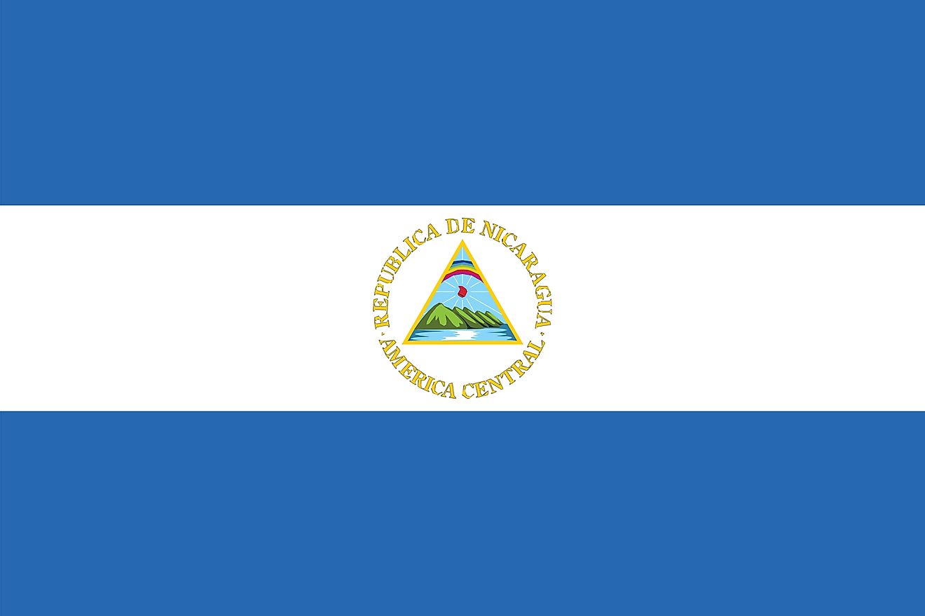 The flag of Nicaragua is a bicolor with three horizontal bands of blue (top), white, and blue with the country’s National Coat of Arms centered on white.