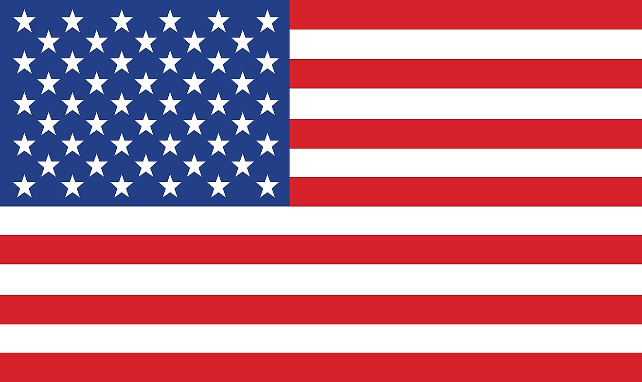 The National Flag of the United States of America features 13 equal horizontal stripes of red (top and bottom) alternating with white stripes. There is a blue rectangle in the upper hoist-side corner bearing 50 small, white, five-pointed stars arranged in