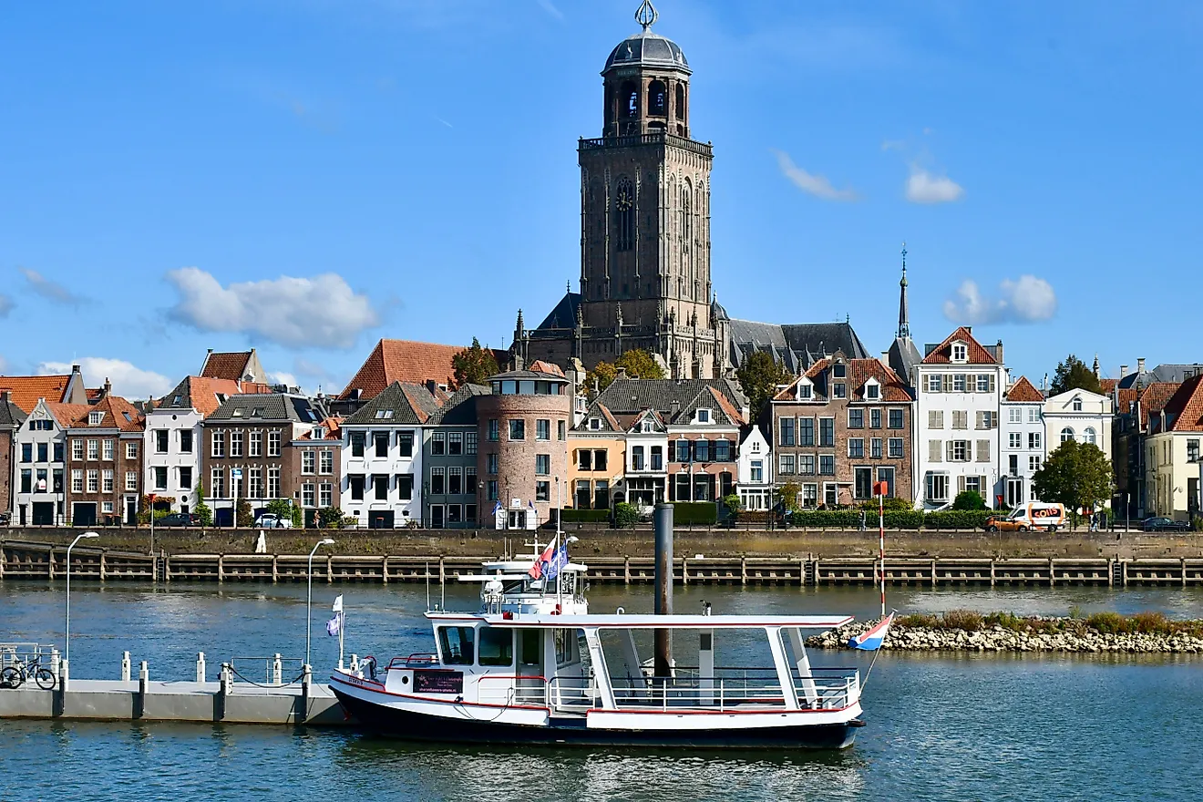 View of the River Ijssel and the historic town of Deventer, the Netherlands in the background. 