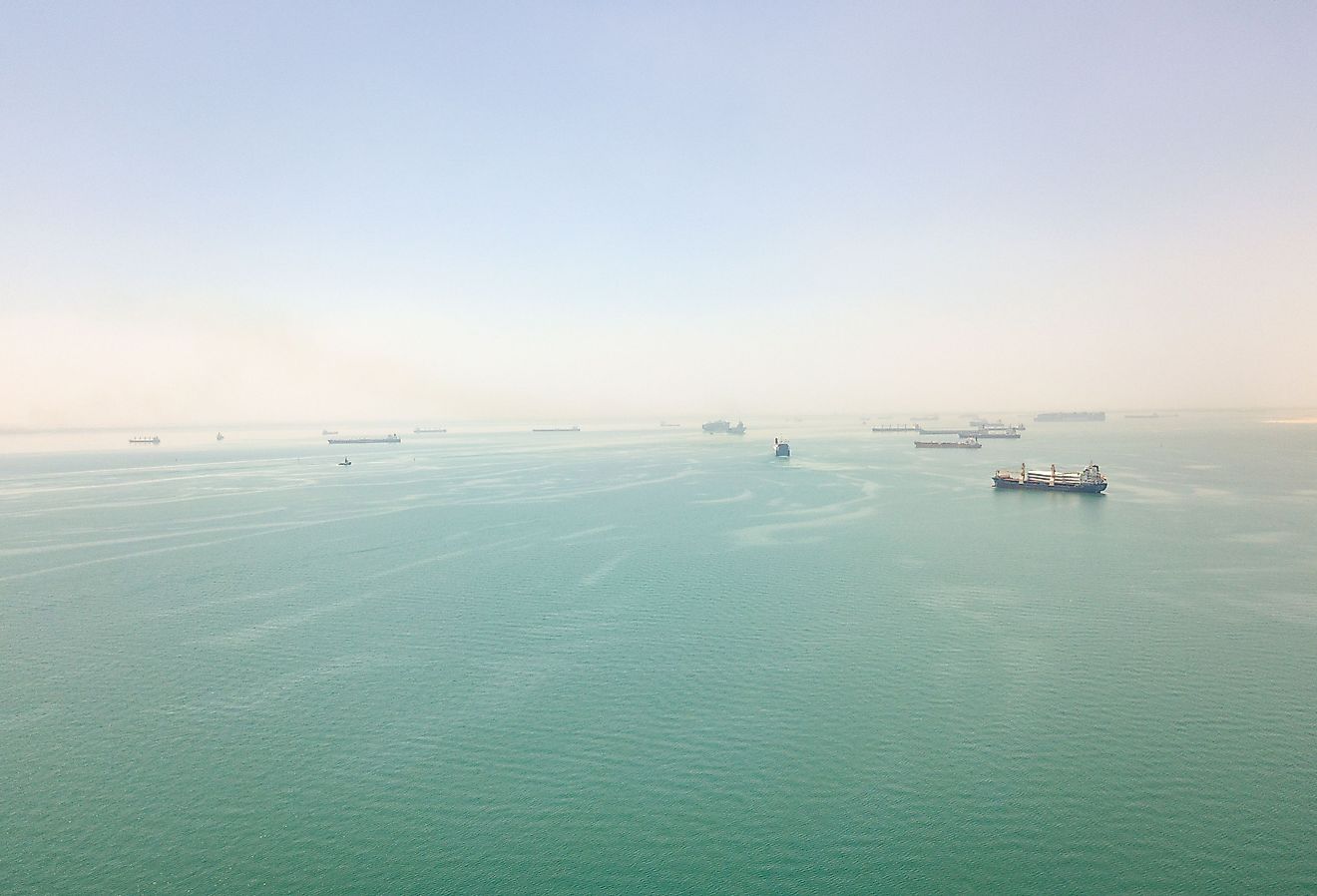 View of ships at anchor in the Great Bitter Lake at the halfway point of the Suez Canal. Image credit FabianIrwin via Shutterstock.