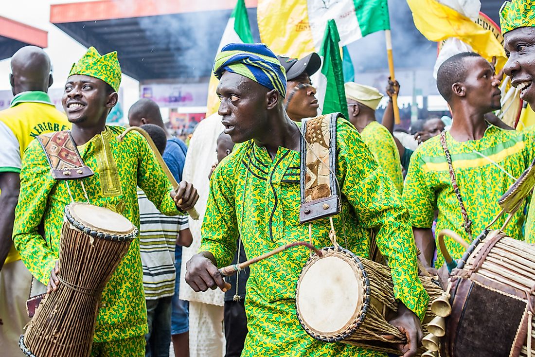 Drummers in traditional Yoruba clothing. Editorial credit: Ajibola Fasola / Shutterstock.com. 