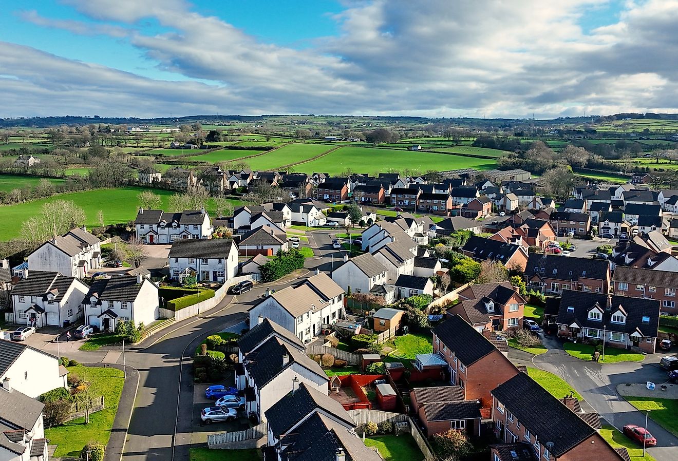 Aerial view of residential housing and businesses in Antrim, Northern Ireland.