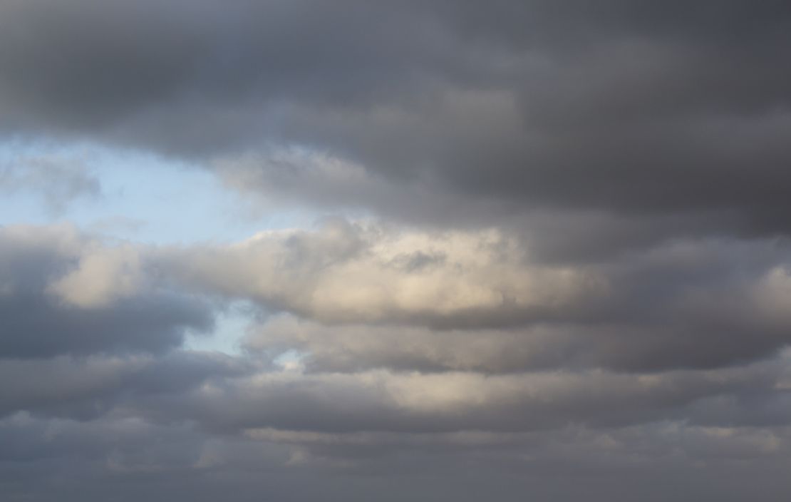 Altostratus clouds holding precipitation. 