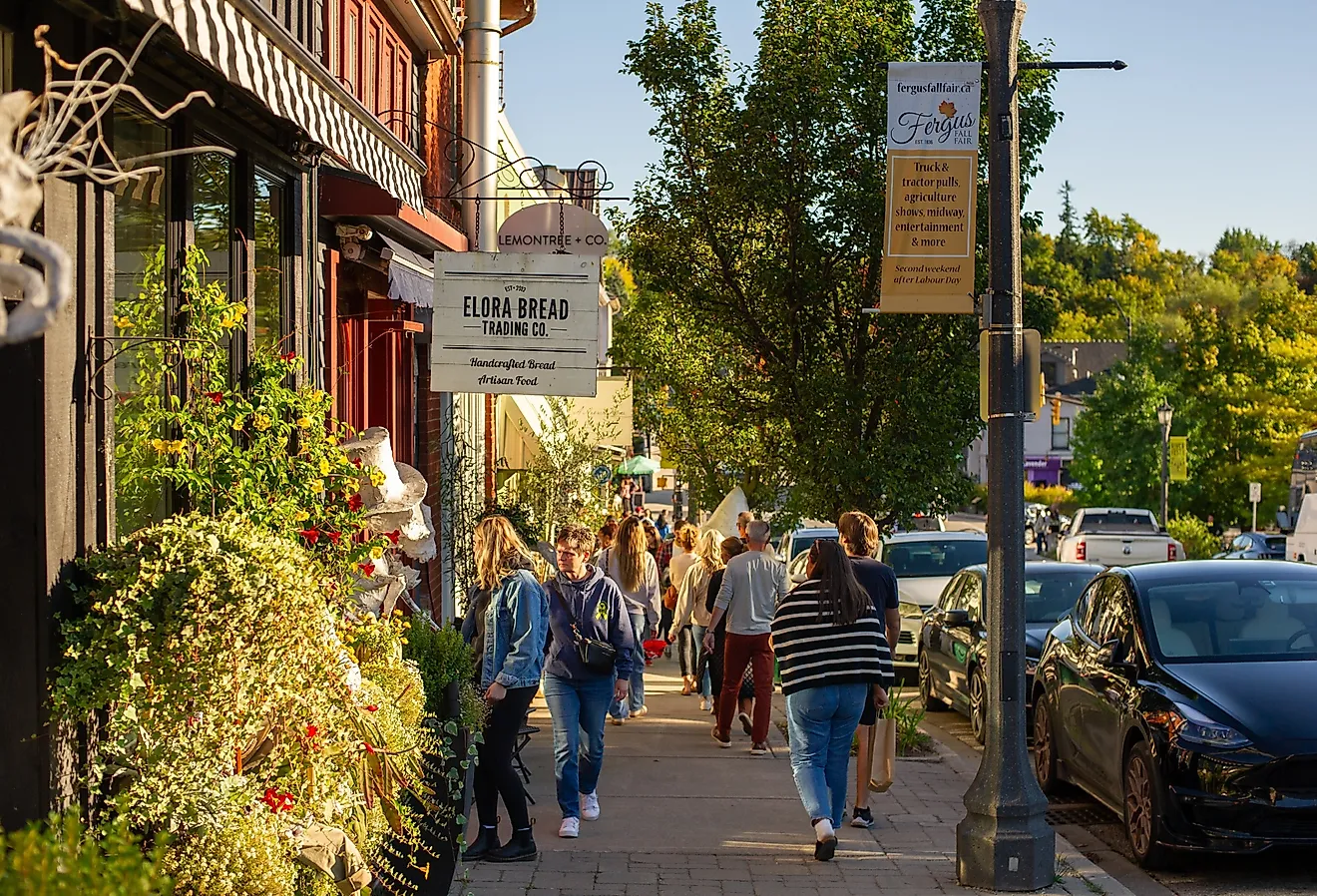 People stroll through the charming streets of Elora, Ontario. Image credit Alessandro Cancian via Shutterstock