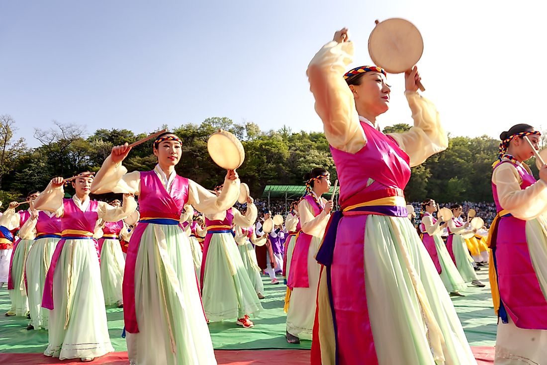 Performers at the Lotus Lantern Festival in Seoul, South Korea. The majority of South Korea's population is made up of ethnic Koreans. Editorial credit: qingqing / Shutterstock.com. 