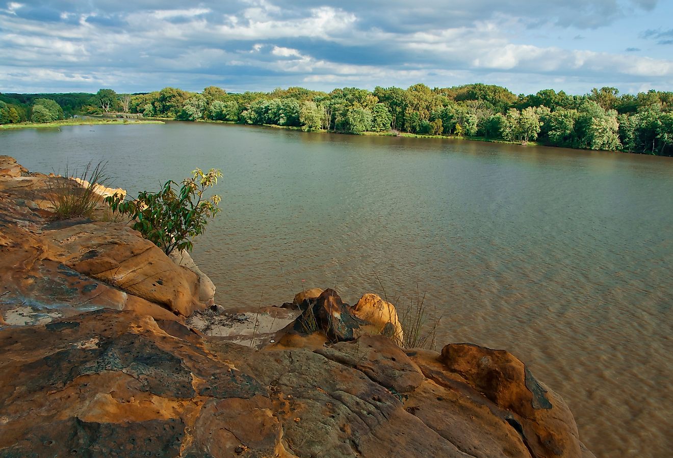 View from a rock of the Illinois River on a summer evening. Image credit Hank Erdmann via AdobeStock.