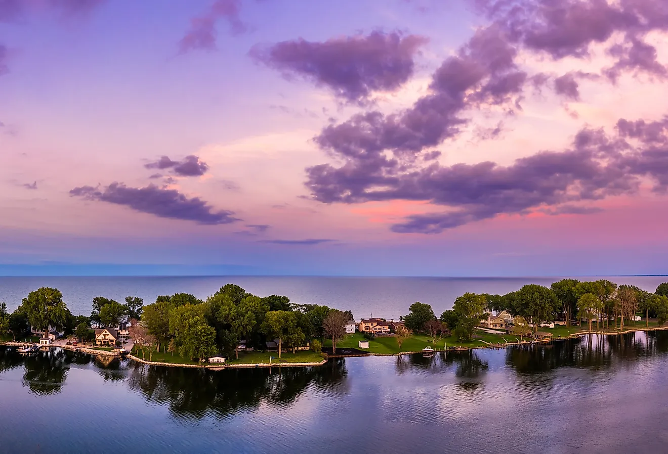 Aerial panorama of the Cedar Point peninsula at dusk, in Sandusky, Ohio, on Lake Erie.