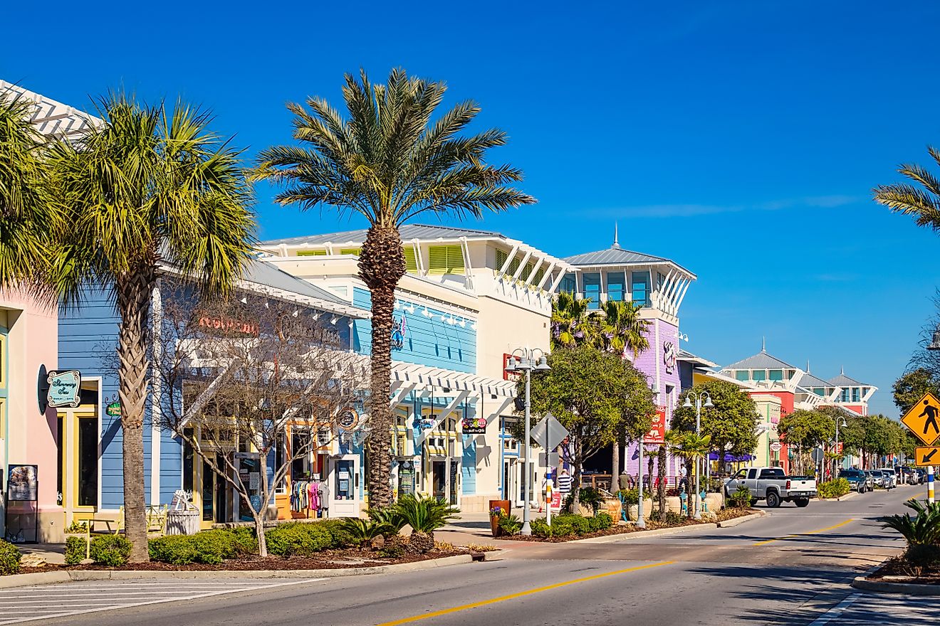 Colorful storefronts in downtown Panama City Beach, Florida, USA on a clear day.