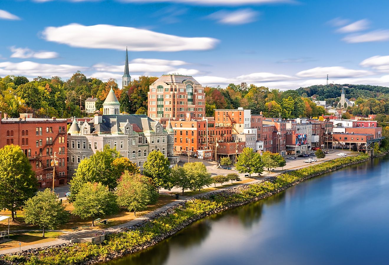 Augusta, Maine skyline along the water on a sunny afternoon.