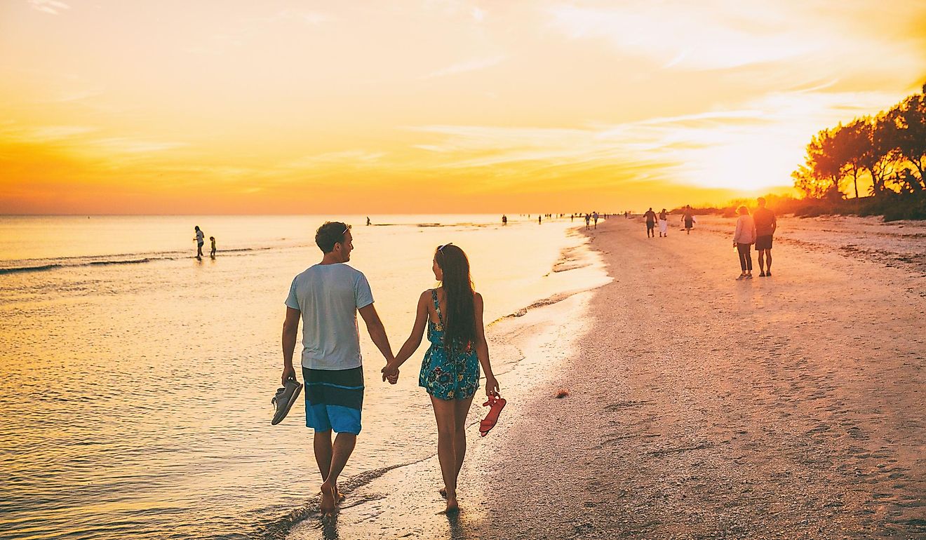 Happy Couple Enjoying Sunset Walk - Gulf of Mexico, Sanibel Island, Florida