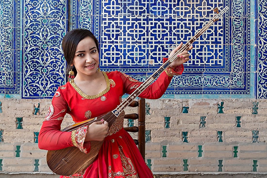An Uzbek woman in national costume. Editorial credit: MehmetO / Shutterstock.com.