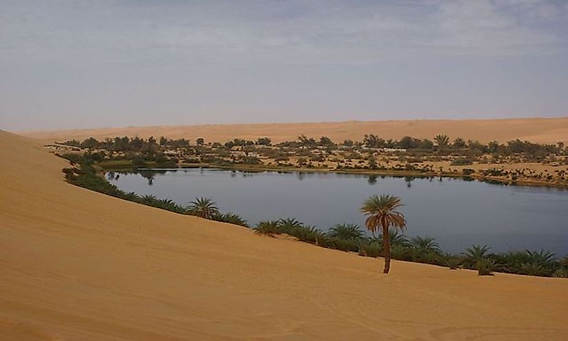 A typical oasis in a desert.