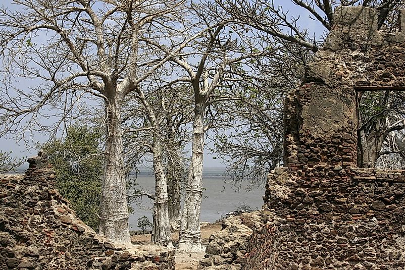 Ruins of the fort on Kunta Kinteh Island amidst the waters of the Gambia River.