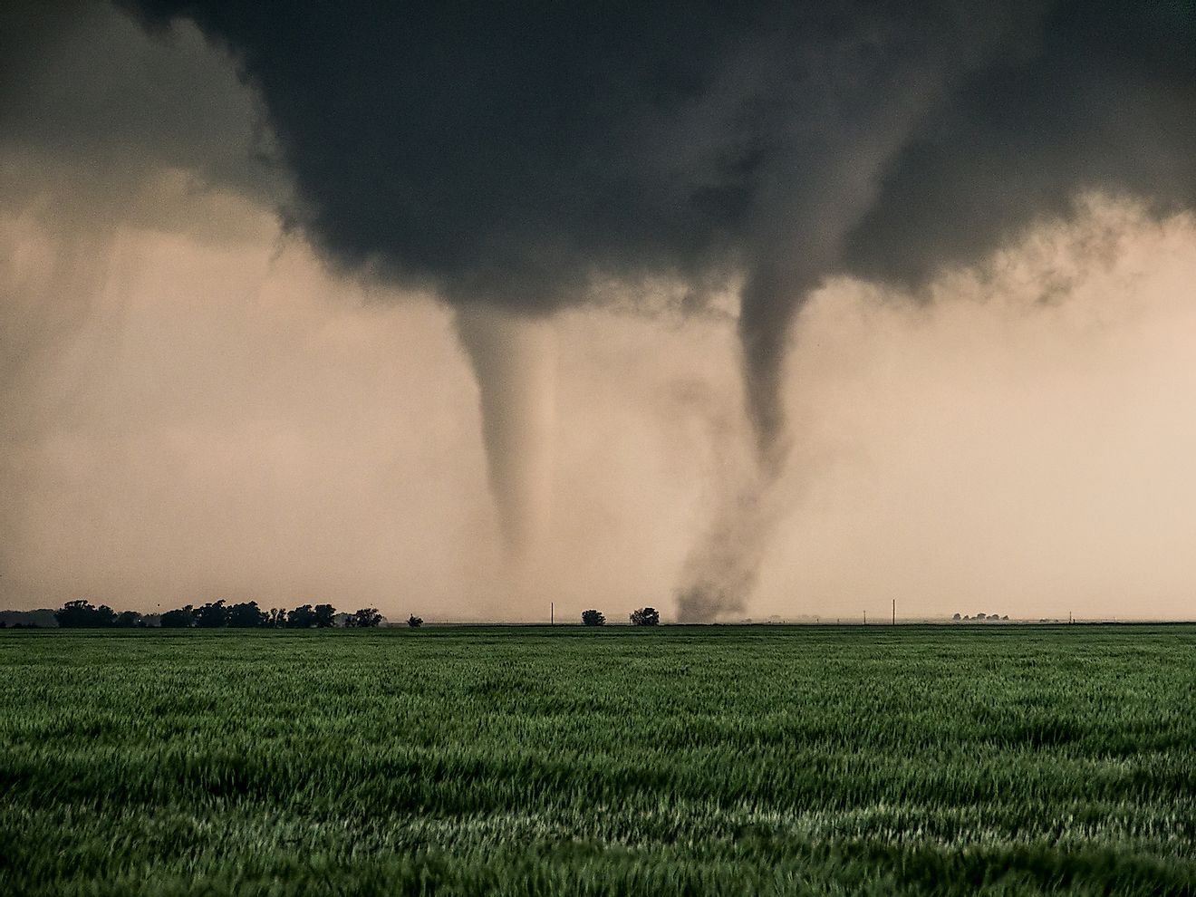 A pair of tornadoes take a destructive path through northern Oklahoma farmyards near Cherokee. Image credit: Eugene R Thieszen/Shutterstock.com