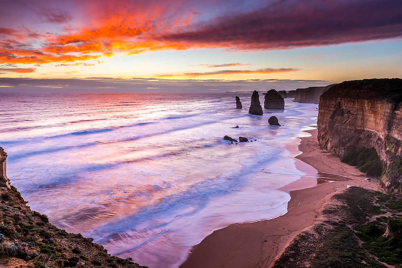 The sun sets over the Twelves Apostles on the Great Ocean Road, Australia. Image credit: James Whitlock/Shutterstock.com