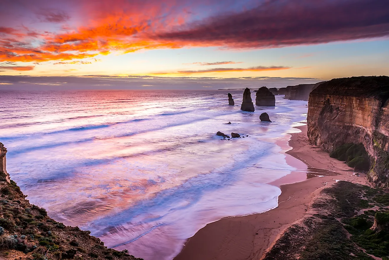 The sun sets over the Twelves Apostles on the Great Ocean Road, Australia. Image credit: James Whitlock/Shutterstock.com