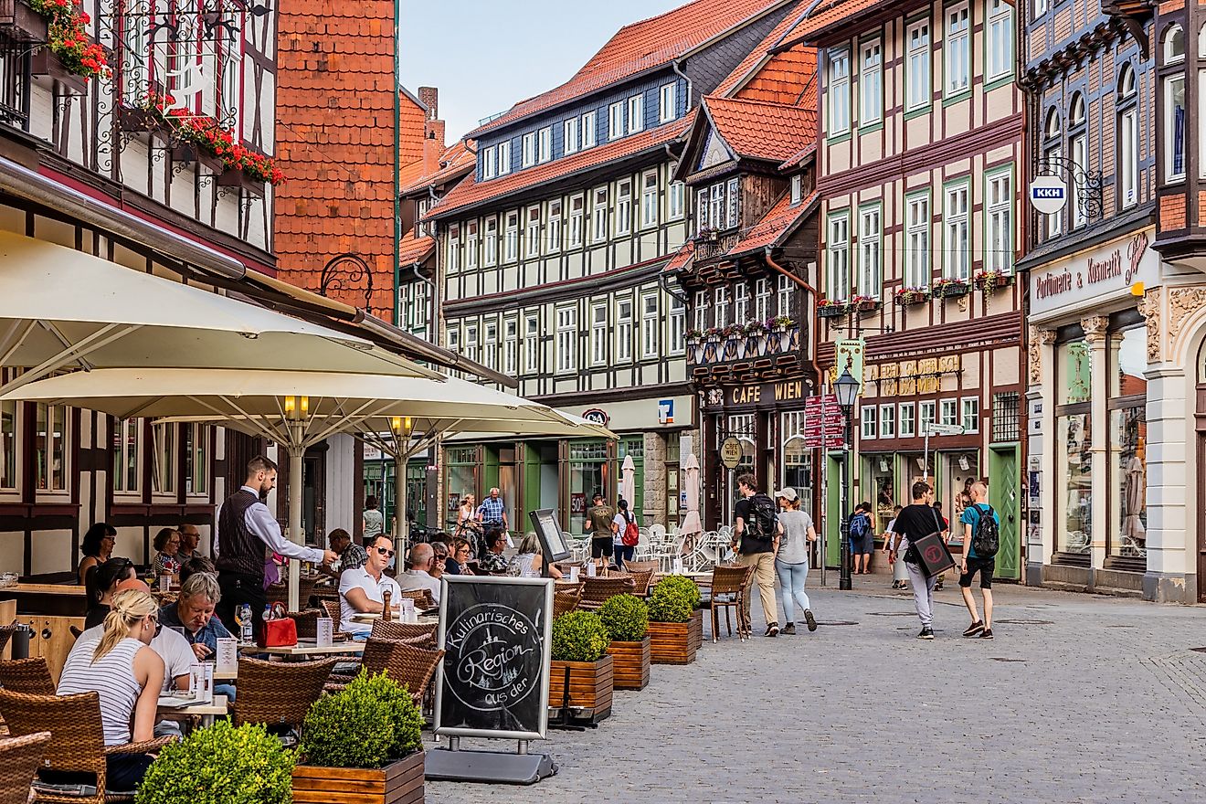Street with a restaurant in old town Wernigerode, Germany.