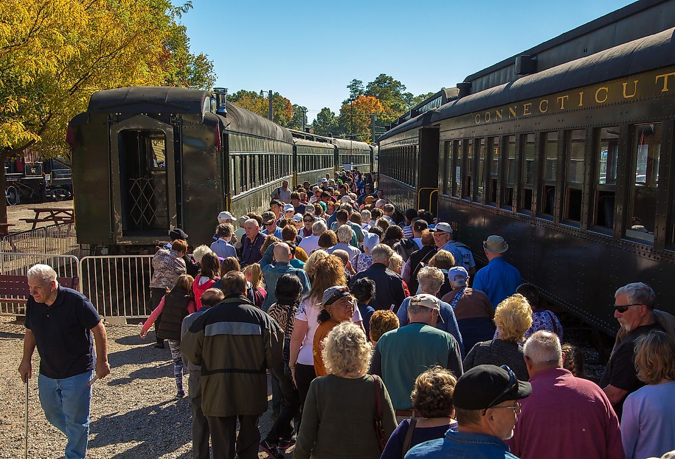 People preparing to board the historic train in Essex, Connecticut. Image credit Bob Pool via Shutterstock