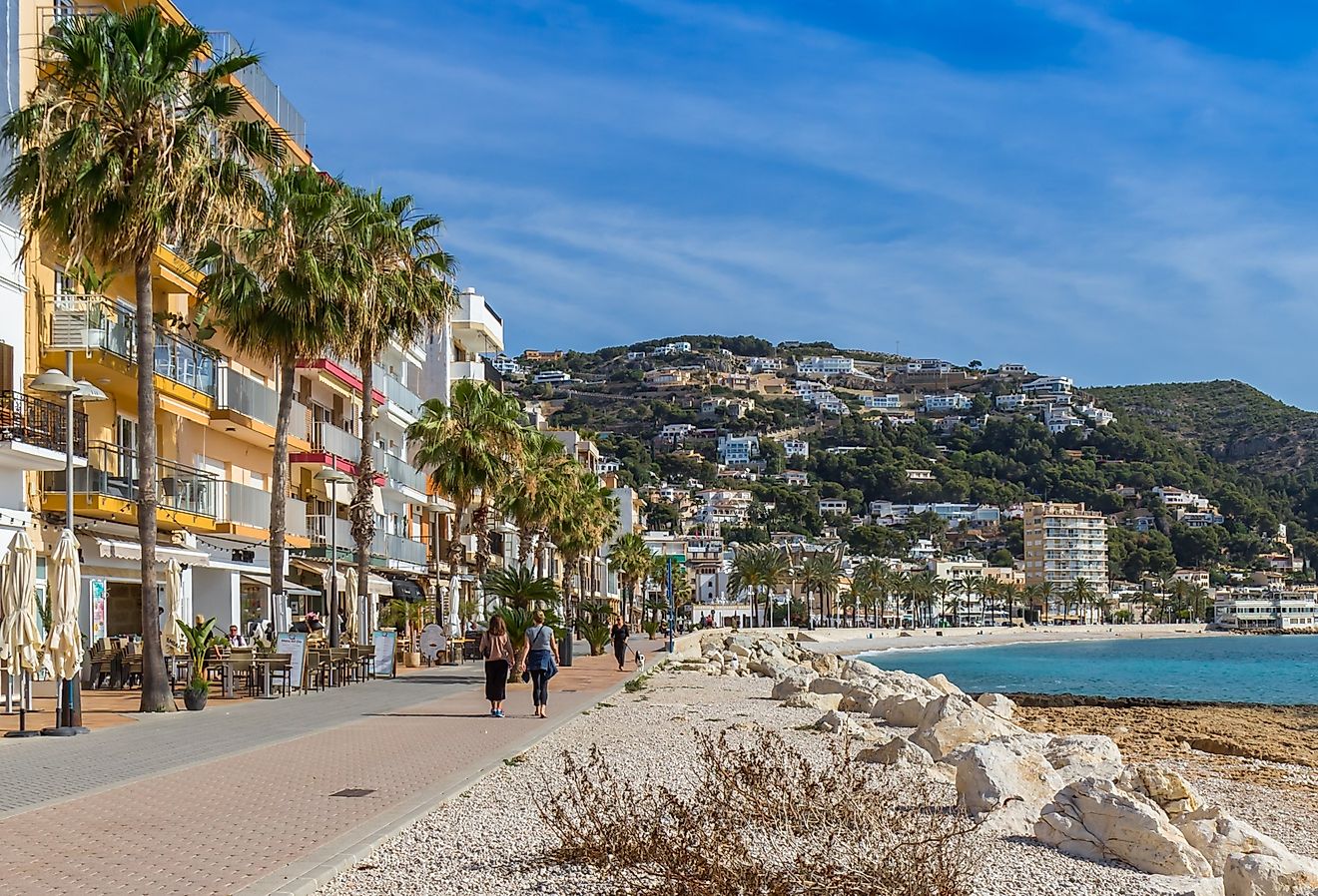 Panorama of the seaside boulevard with bars and restaurants in Javea, Spain. Image Credit: Marc Venema via Shutterstock.com