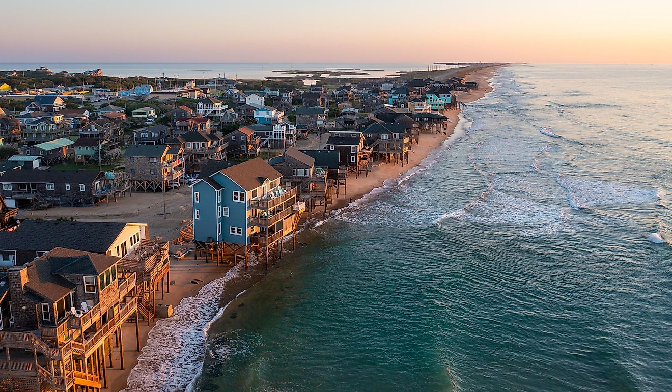 Aerial view of homes right on the shoreline in Buxton, North Carolina.