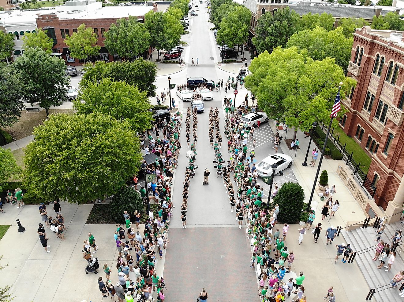 Community parade in Southlake, Texas celebrating the Emerald Belles. Editorial credit: Tallmaple / Shutterstock.com