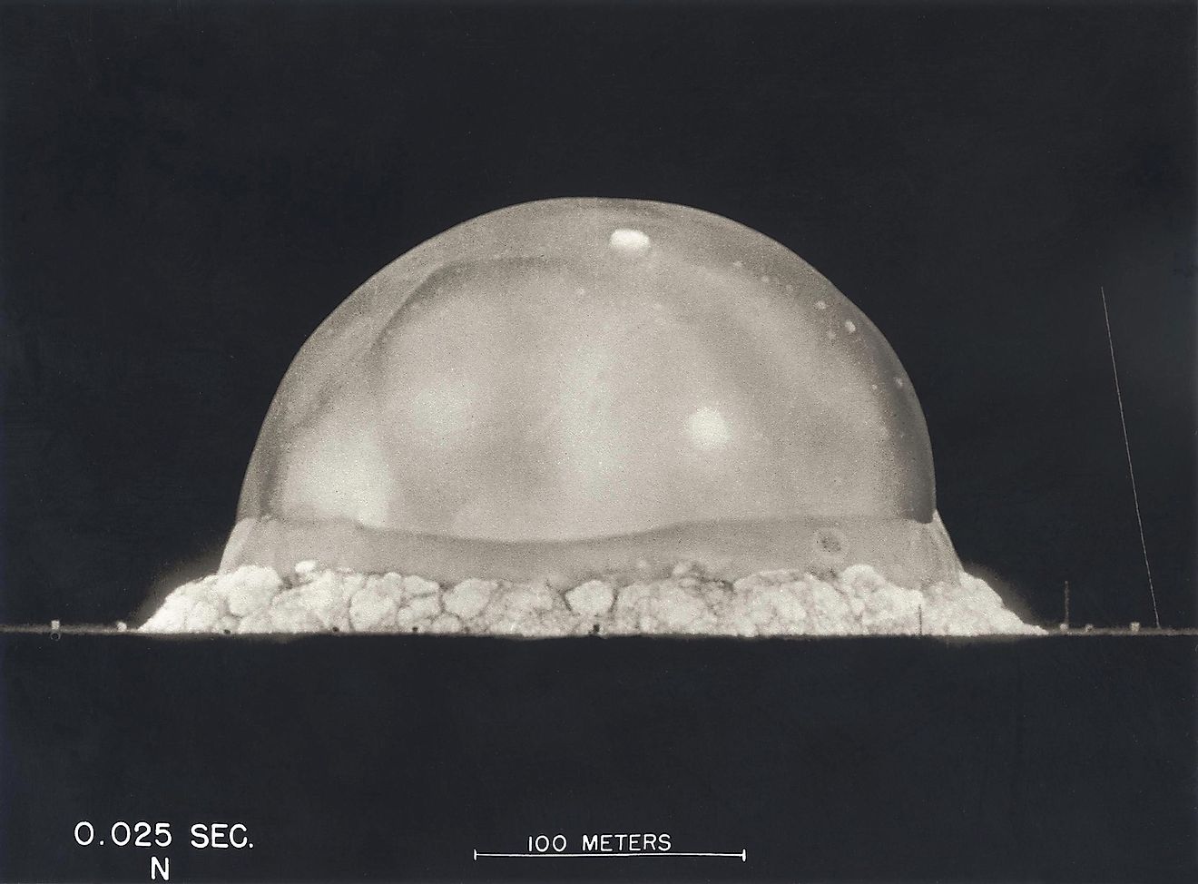 Photograph taken at .025 seconds after the Trinity initial detonation shows a plasma dome. Manhattan Project, World War 2. Alamogordo, New Mexico. Image credit: Everett Historical/Shutterstock.com