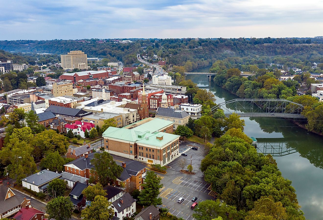 The Kentucky River meanders along framing the downtown urban core of Frankfort, Kentucky. Image credit Real Window Creative via Shutterstock.