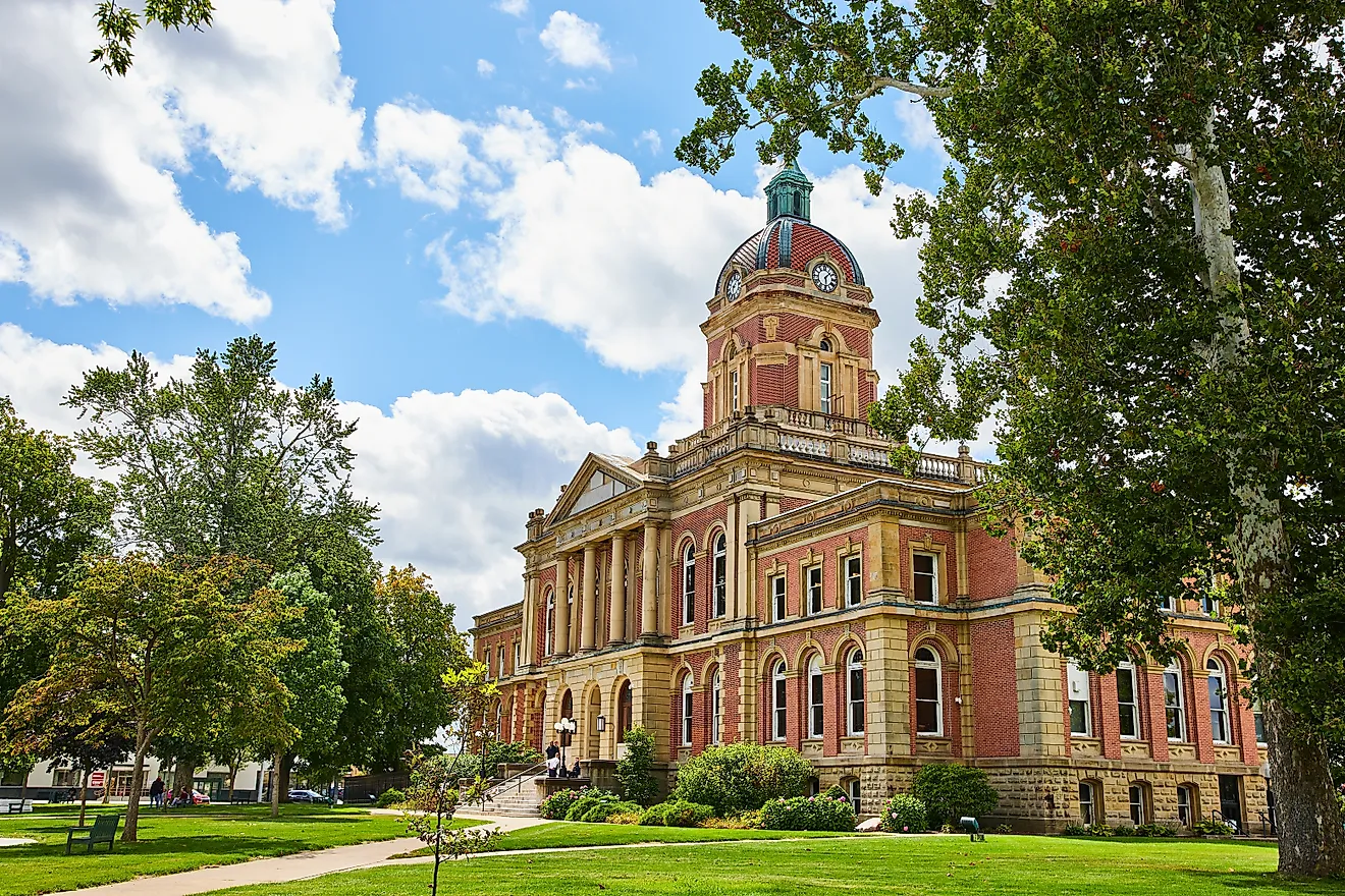 Elkhart County courthouse, IN on blue sky day with fluffy white clouds, law and order, summer day