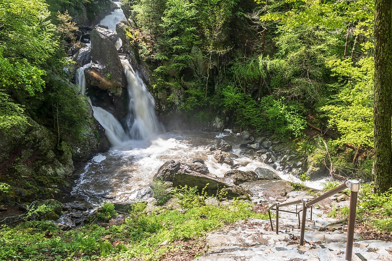 Bash Bish Falls is located in the woods in Bash Bish State Park in Mount Washington, Massachusetts