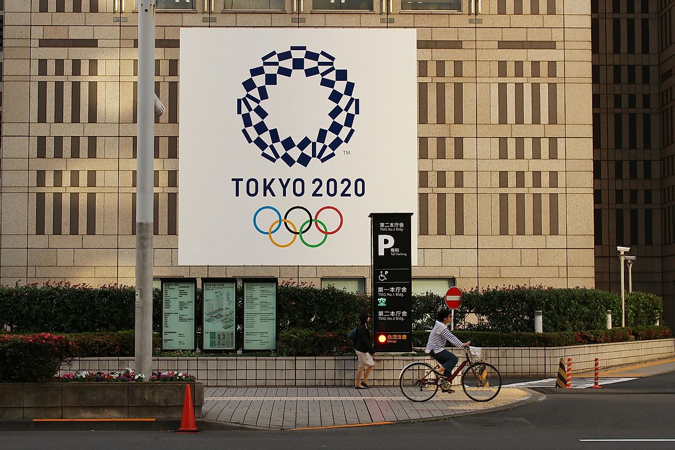 The Kenzo Tange-designed Tokyo Metropolitan Government Building adorned with a large rendering of 2020 Tokyo Olympics logo.