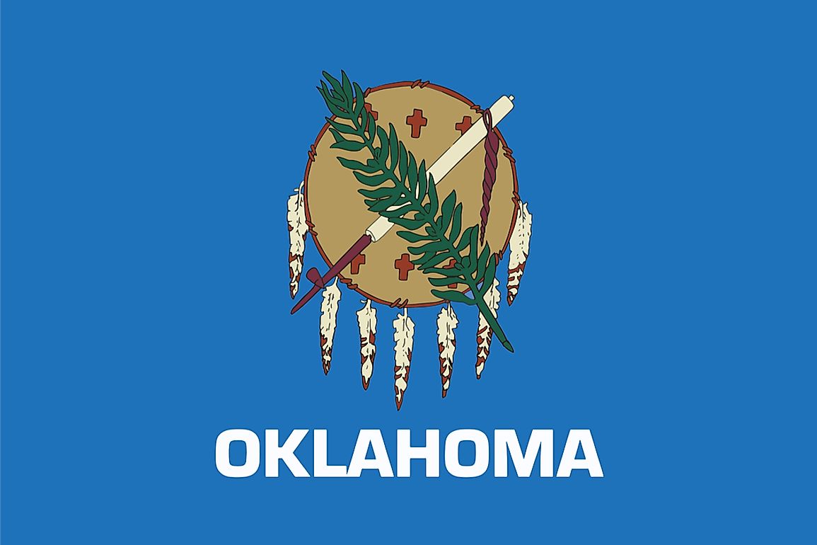 The official Oklahoma state flag has a blue field with a traditional Osage-Nation Buffalo shield at the center. 