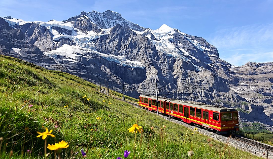 Jungfrau Railway traveling from Jungfraujoch to Kleine Scheidegg in Bernese Oberland, Switzerland.