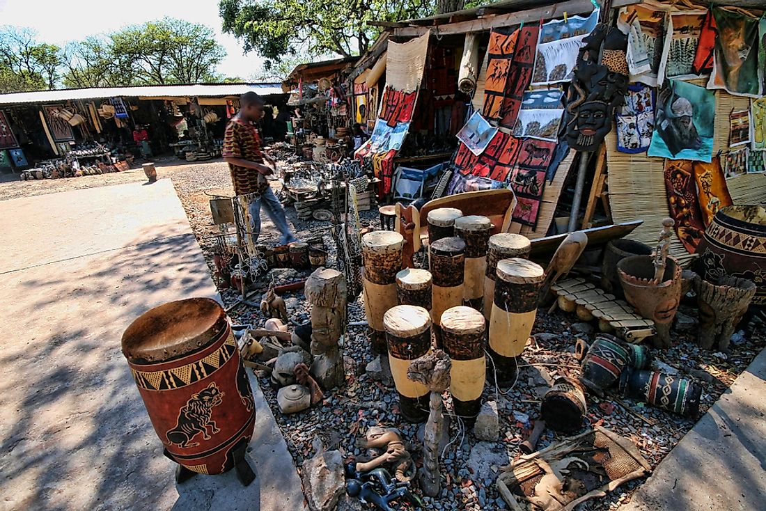 Locally made souvenirs on sale in Victoria Falls, Zambia. Editorial credit: Vladislav T. Jirousek / Shutterstock.com.