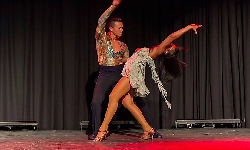 A couple performing a salsa dance.