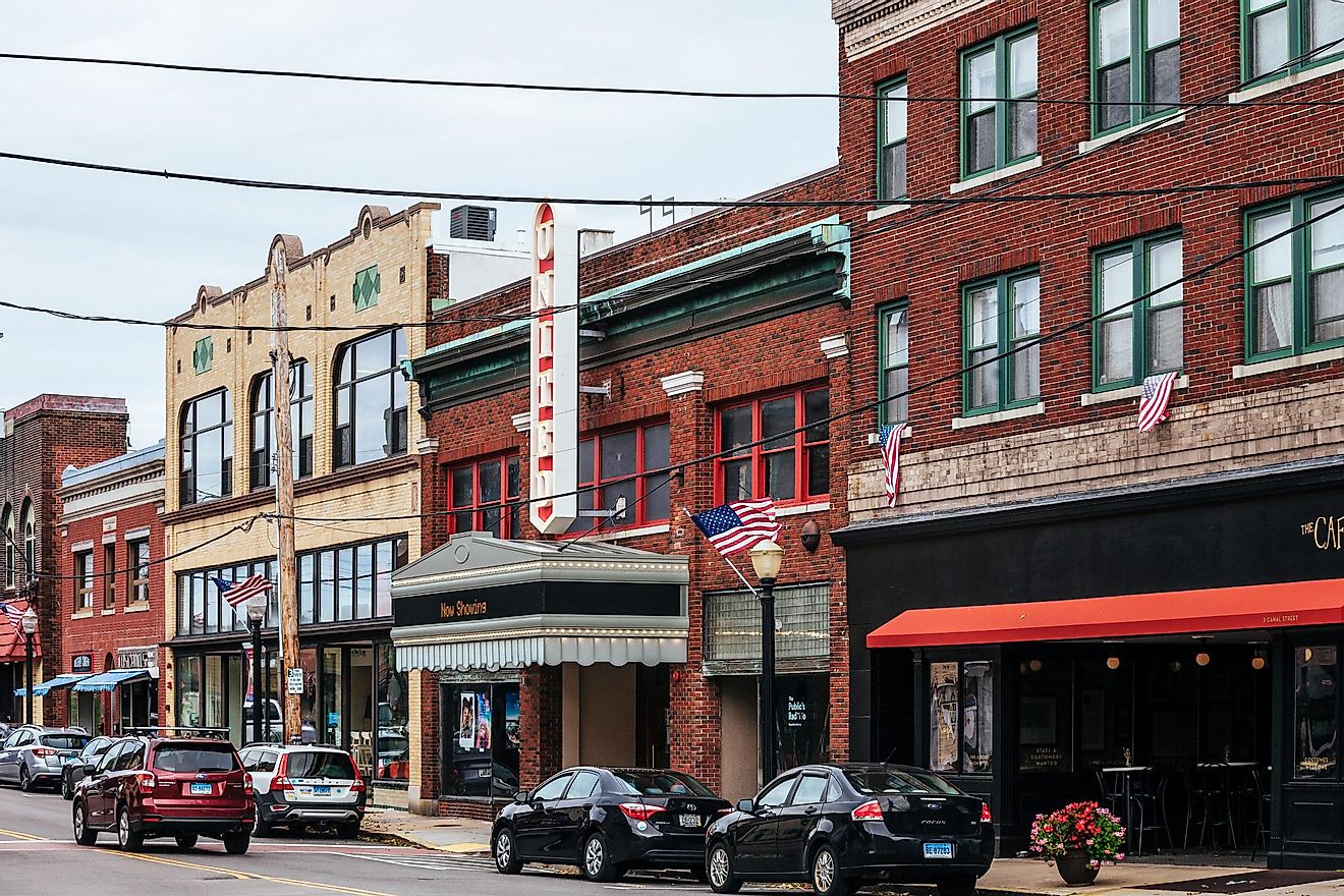 Westerly, Rhode Island: High Street with colourful buildings and a few people. via peeterv / iStock.com