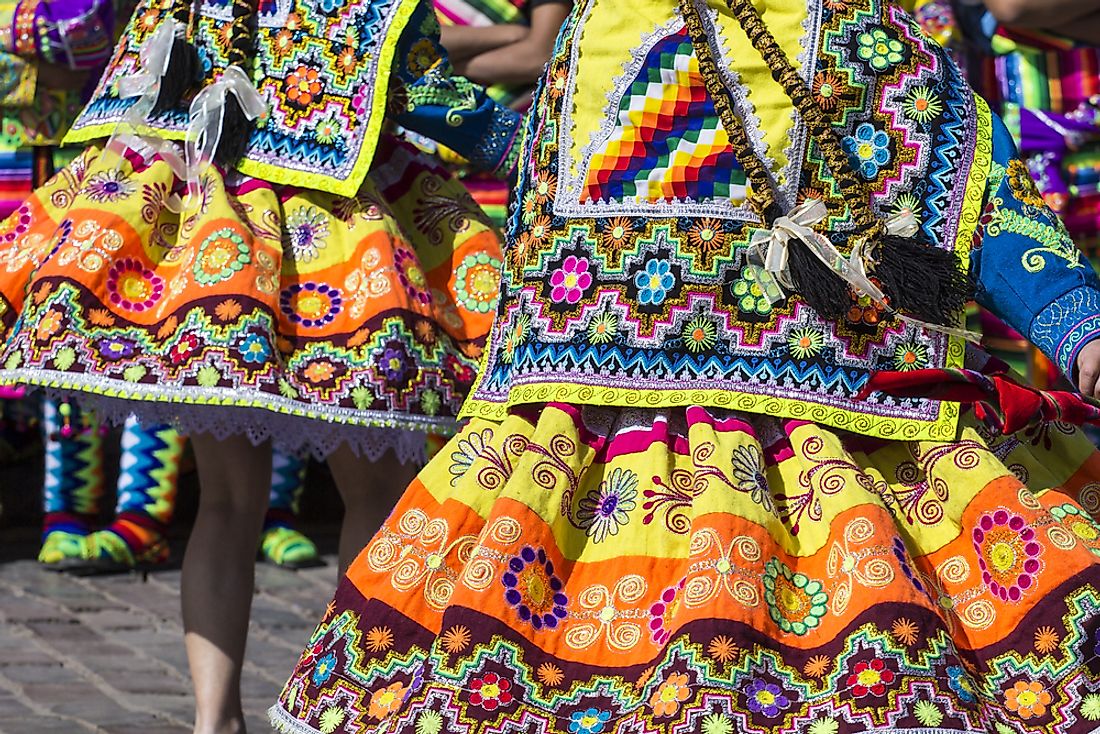 Dancers dressed in traditional Peruvian clothing in a parade in Cusco, Peru. 