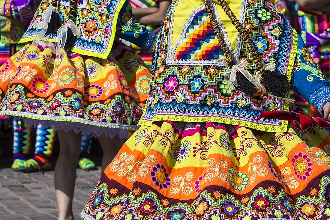Dancers dressed in traditional Peruvian clothing in a parade in Cusco, Peru.